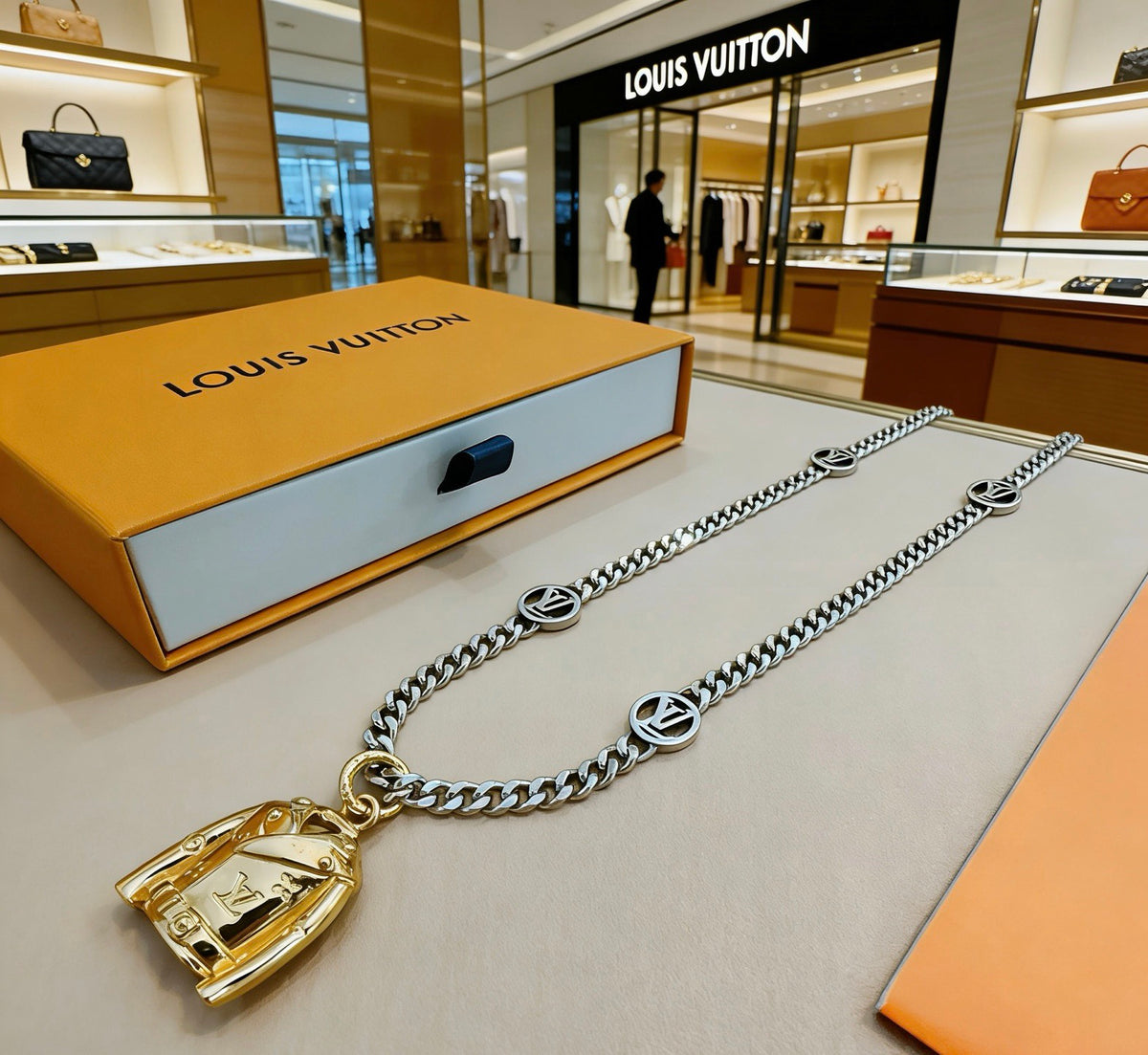 Martin Graham pendant necklace in polished metal-tone – front product view