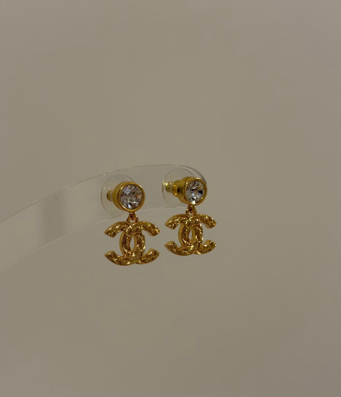 Double-C Emblem Stud Earrings in Gold-Tone – Design 041 side detail
