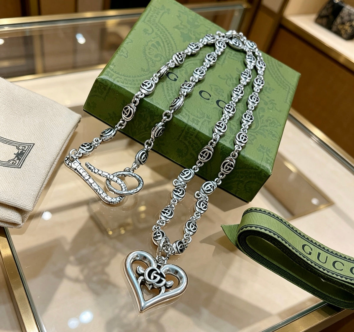 Double-G Emblem Pendant Necklace in Polished Metal-Tone – Design 232 side detail
