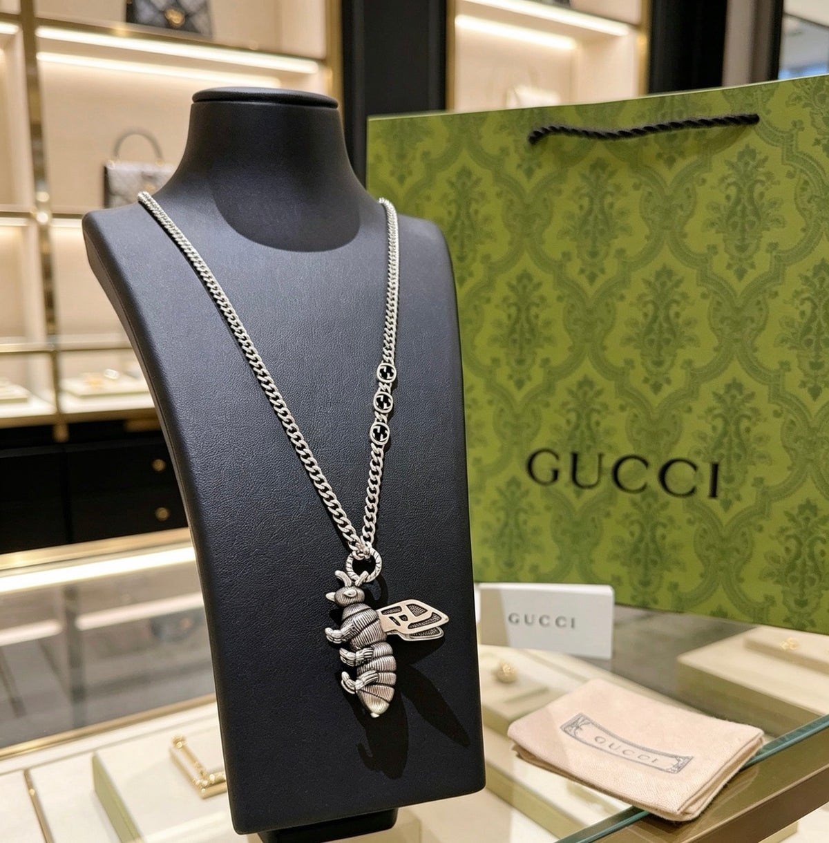 Double-G Emblem Pendant Necklace in Polished Metal-Tone – Design 226 close-up detail