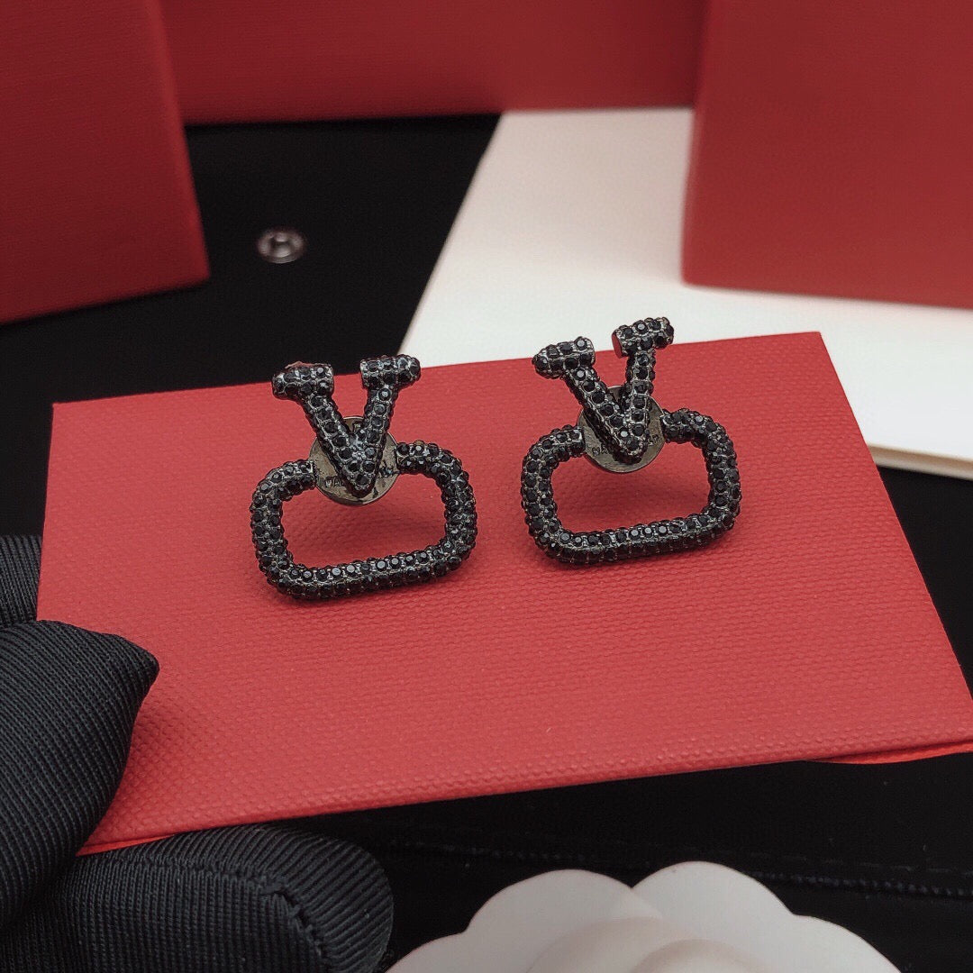 Signature Emblem Crystal-Accent Stud Earrings – Black – Design 04 styled detail