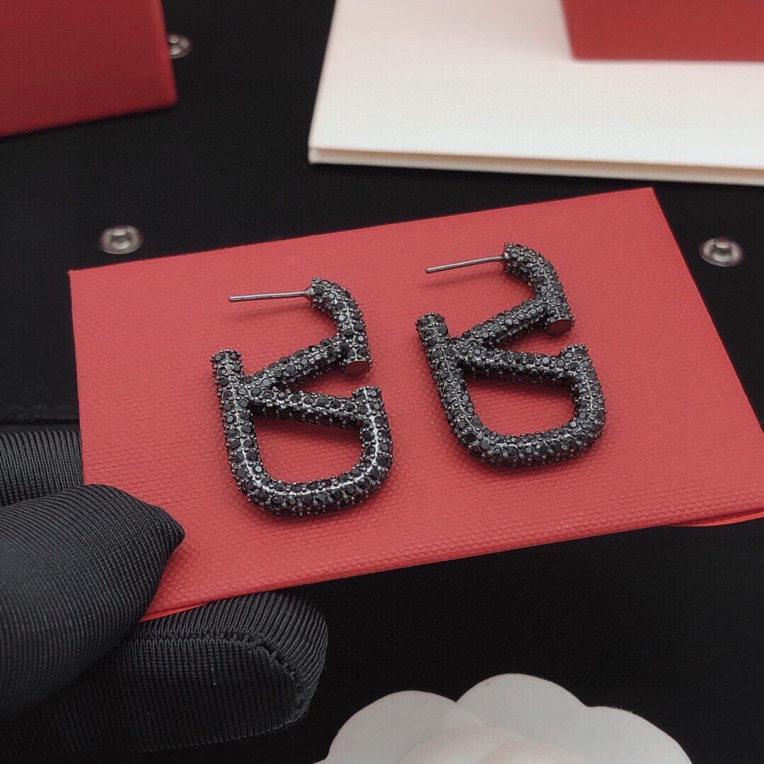Signature Emblem Crystal-Accent Stud Earrings – Black – Design 02 detail view