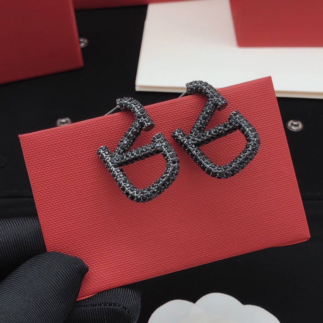 Signature Emblem Crystal-Accent Stud Earrings – Black front view