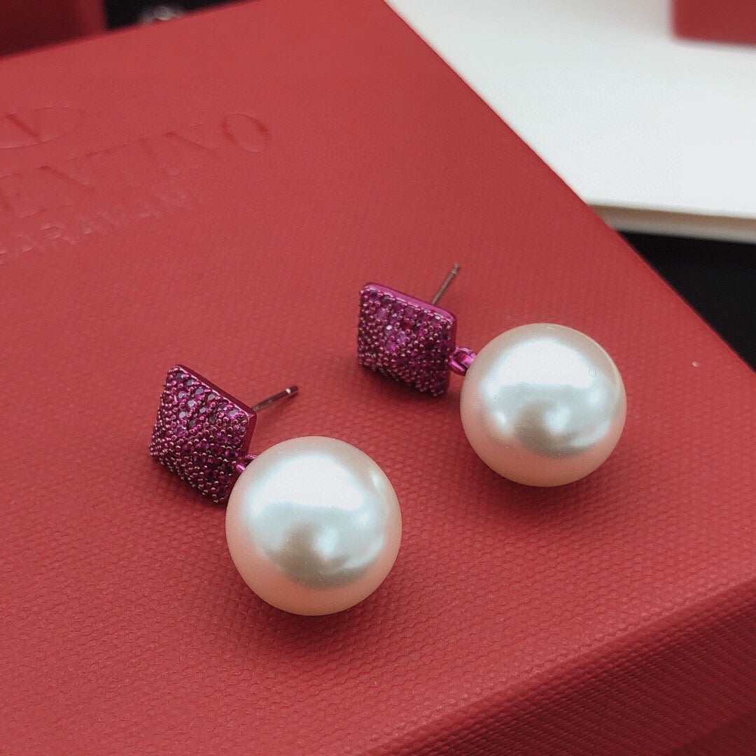Triangle Pearl-Detail Stud Earrings styled detail