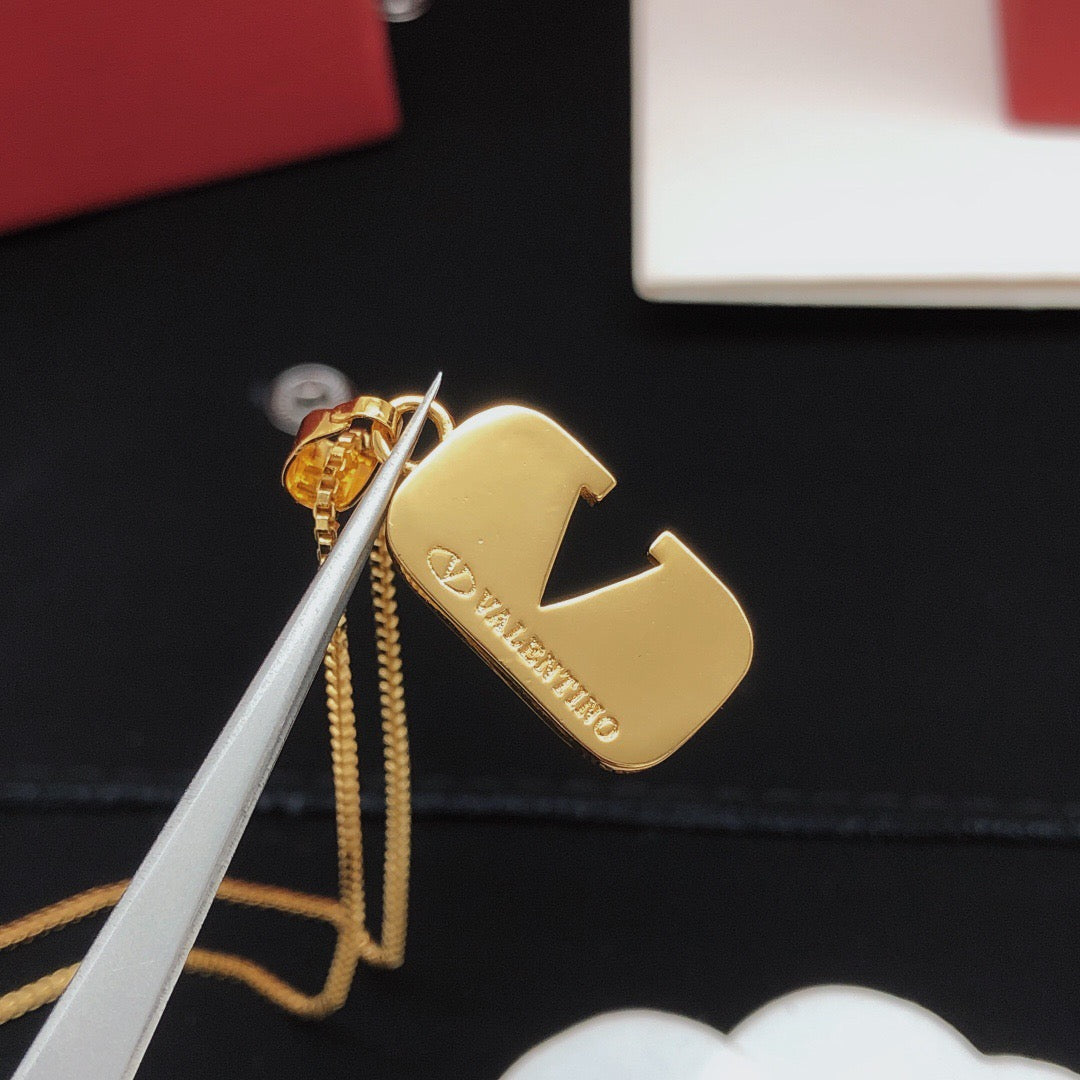 Signature Emblem Crystal-Accent Pendant Necklace – Design 06 close-up view