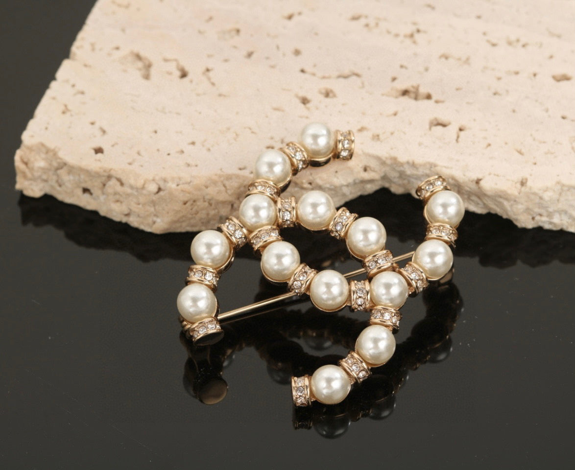 Double-C Emblem Brooch in Polished Metal-Tone – Design 008 styled product view