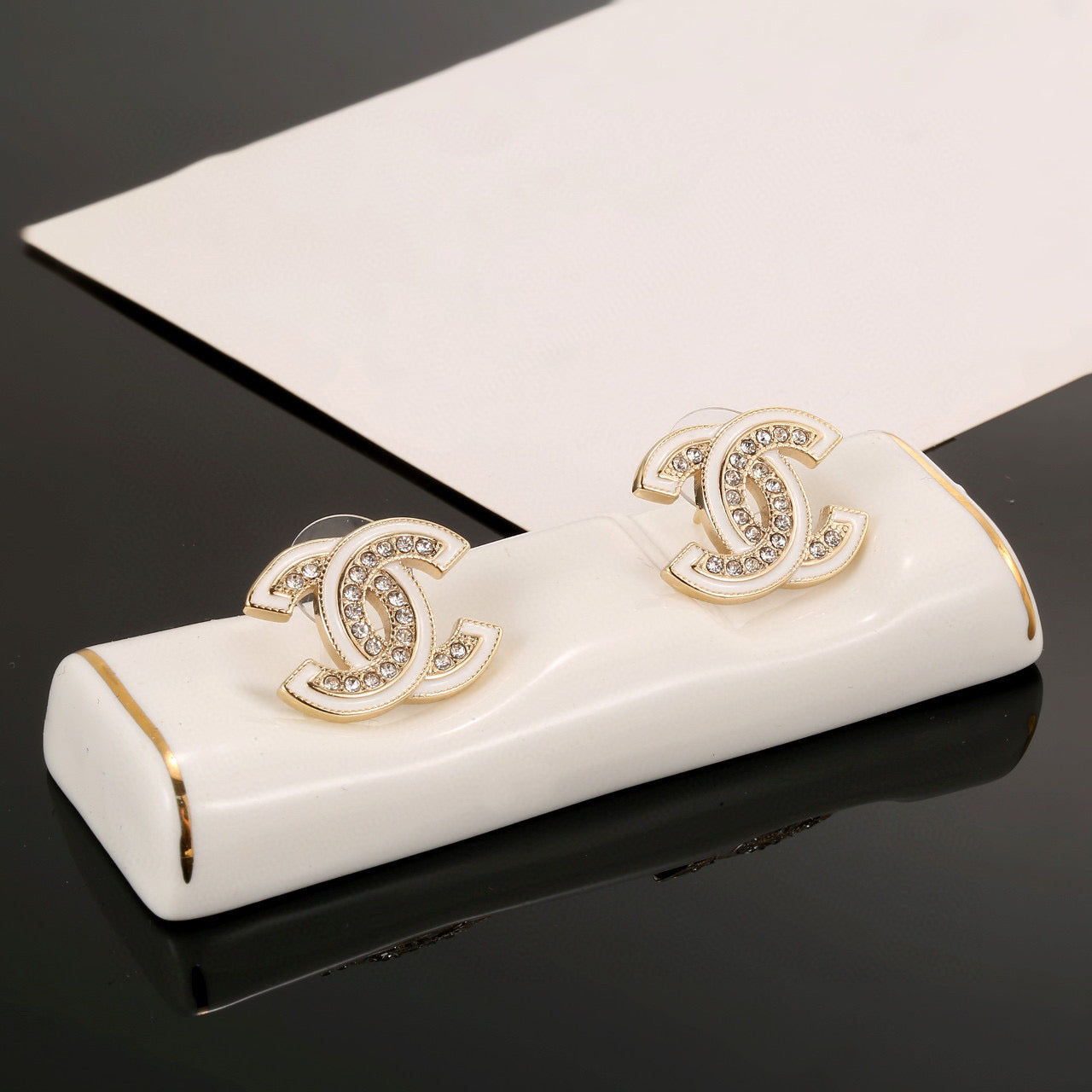 Double-C Emblem Stud Earrings in Polished Metal-Tone – Design 024 front product view