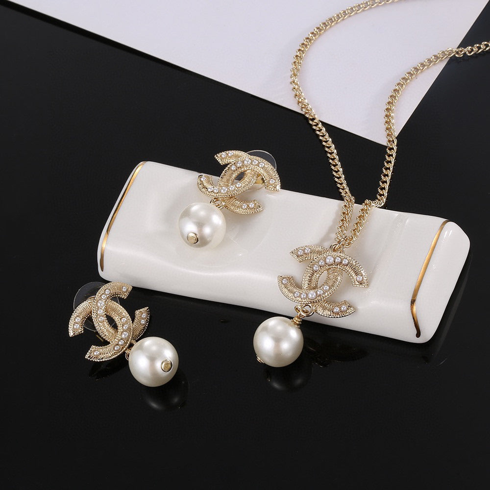 Double-C Emblem Pearl-Detail Pendant Necklace – Pearl Detail – Design 130 main product view