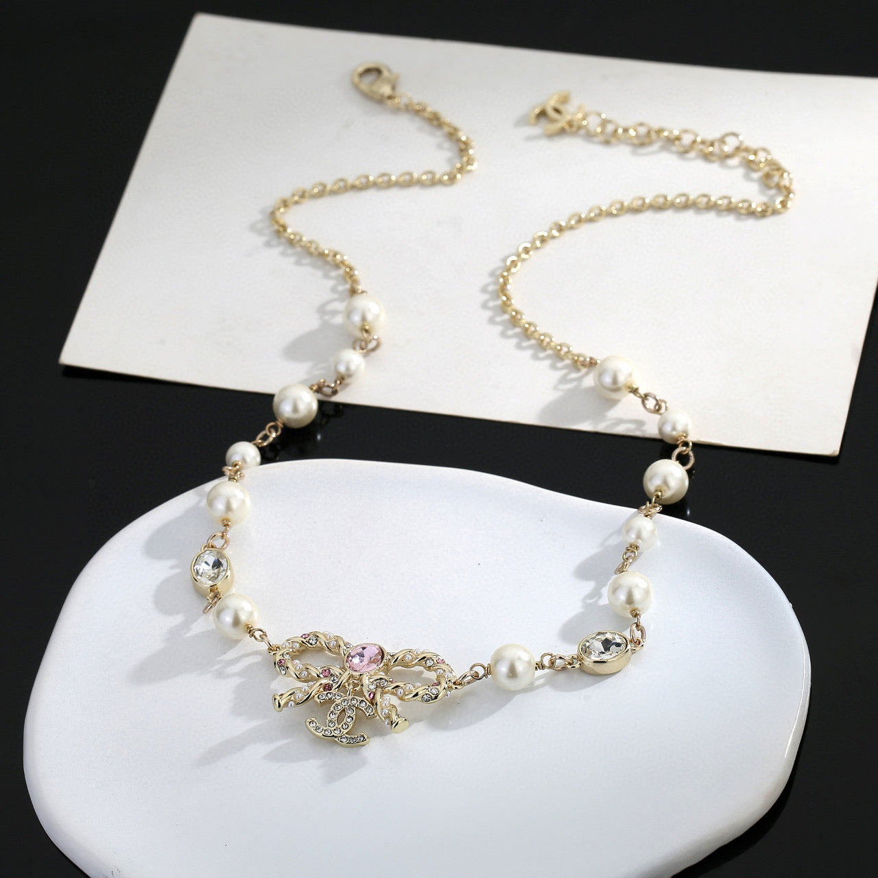 Bow Pearl-Detail Pendant Necklace – Pearl Detail – Design 002 styled product view