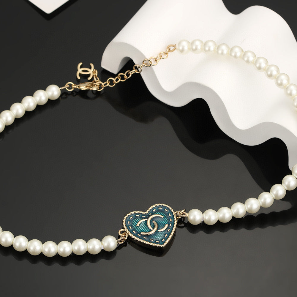 Double-C Emblem Bracelet in Polished Metal-Tone – Pearl Detail – Design 003 detail view