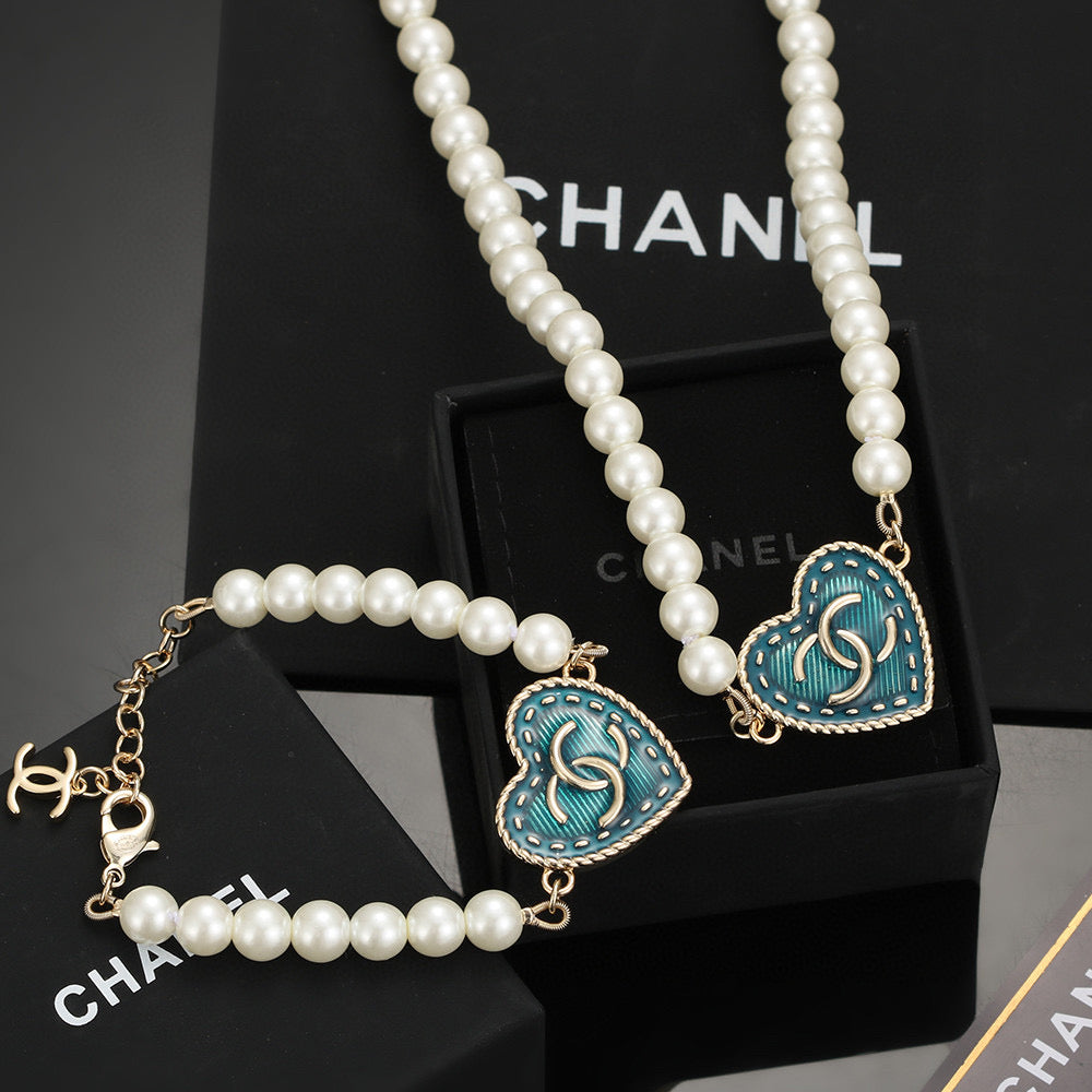 Double-C Emblem Bracelet in Polished Metal-Tone – Pearl Detail – Design 004 main product view