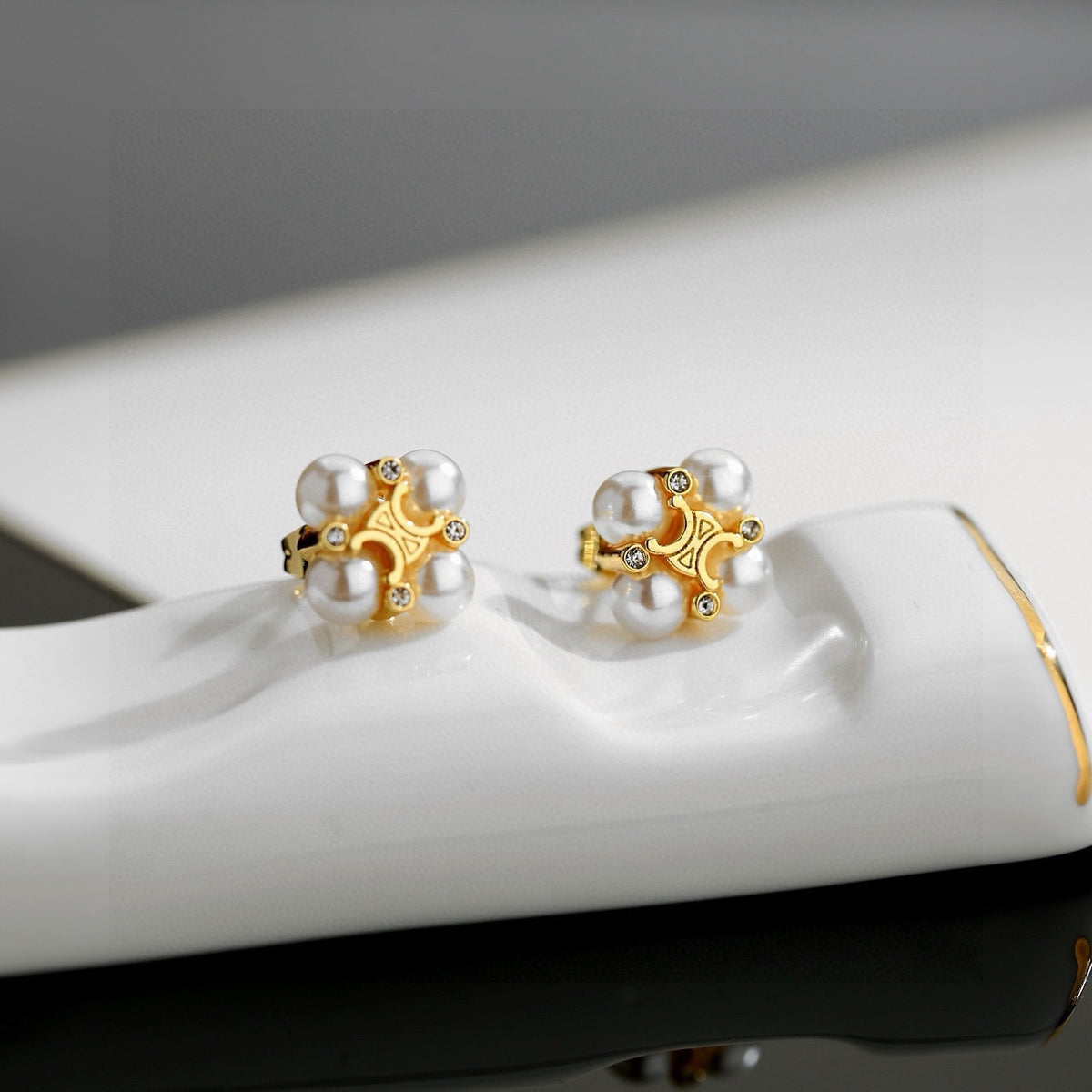Signature Emblem Stud Earrings in Gold-Tone – Design 11 front view