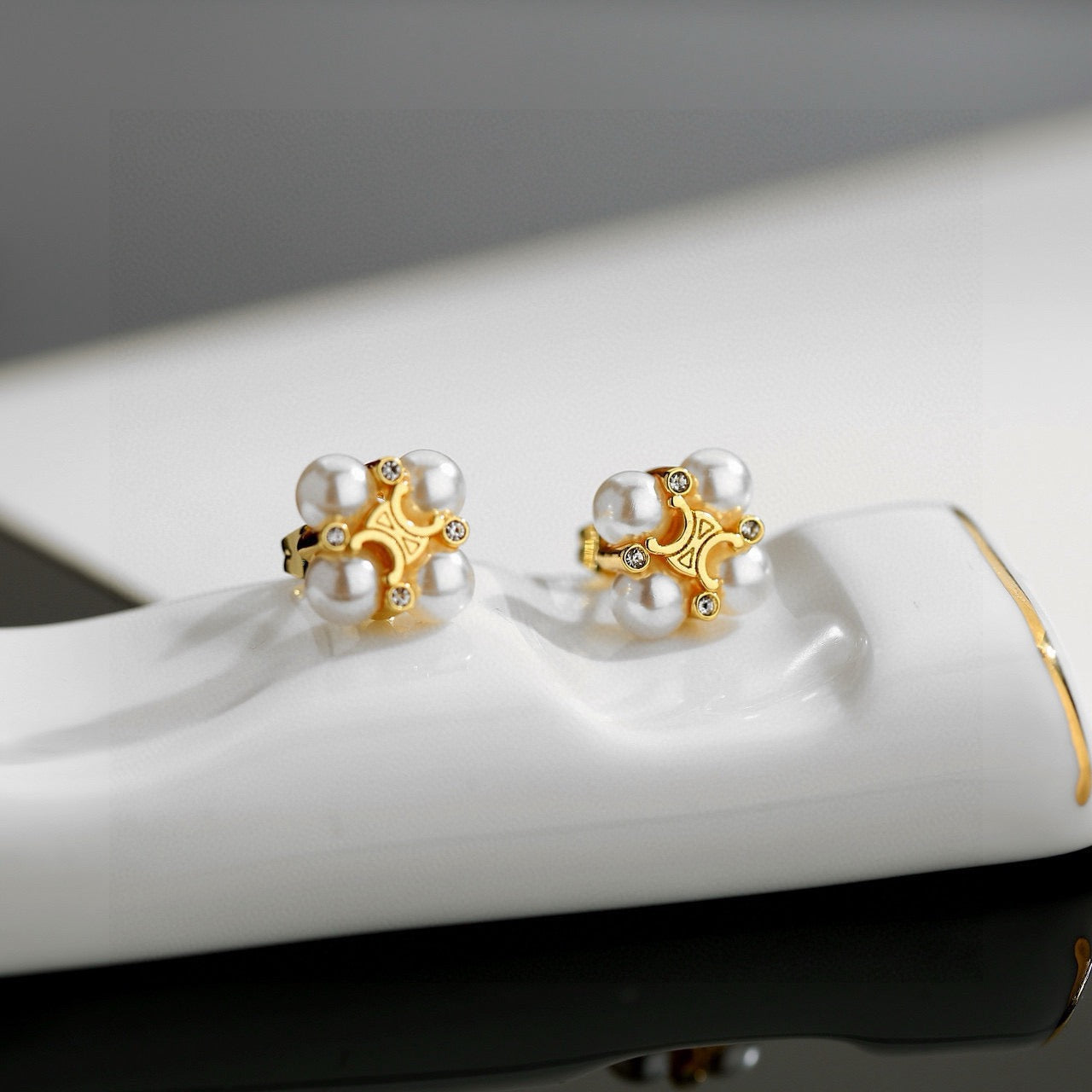 Signature Emblem Stud Earrings in Gold-Tone – Design 11 front view