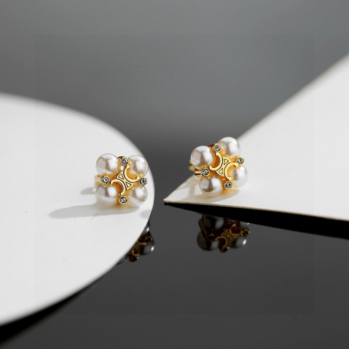 Signature Emblem Stud Earrings in Gold-Tone – Design 10 close-up view