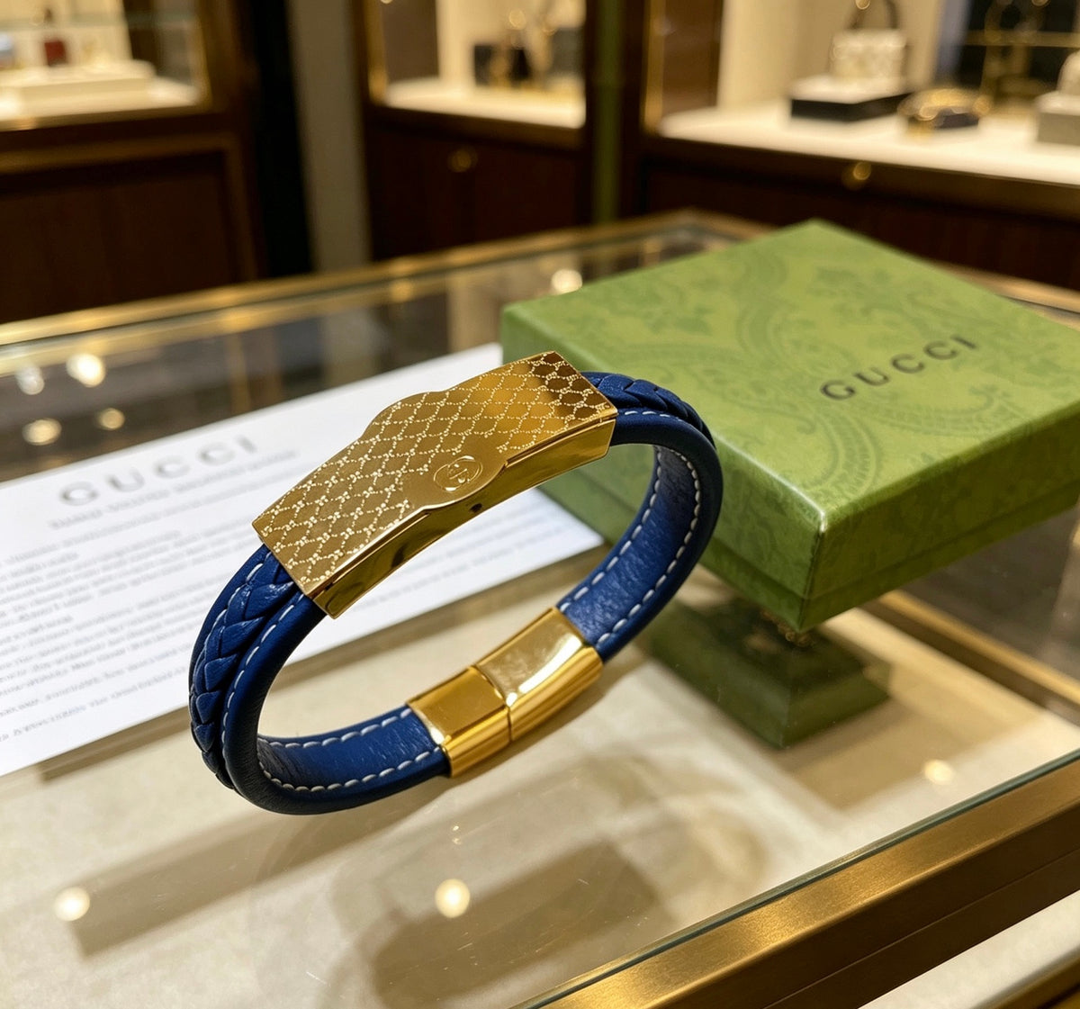 Double-G Emblem Bangle in Polished Metal-Tone – Leather Detail – Design 004 front product view