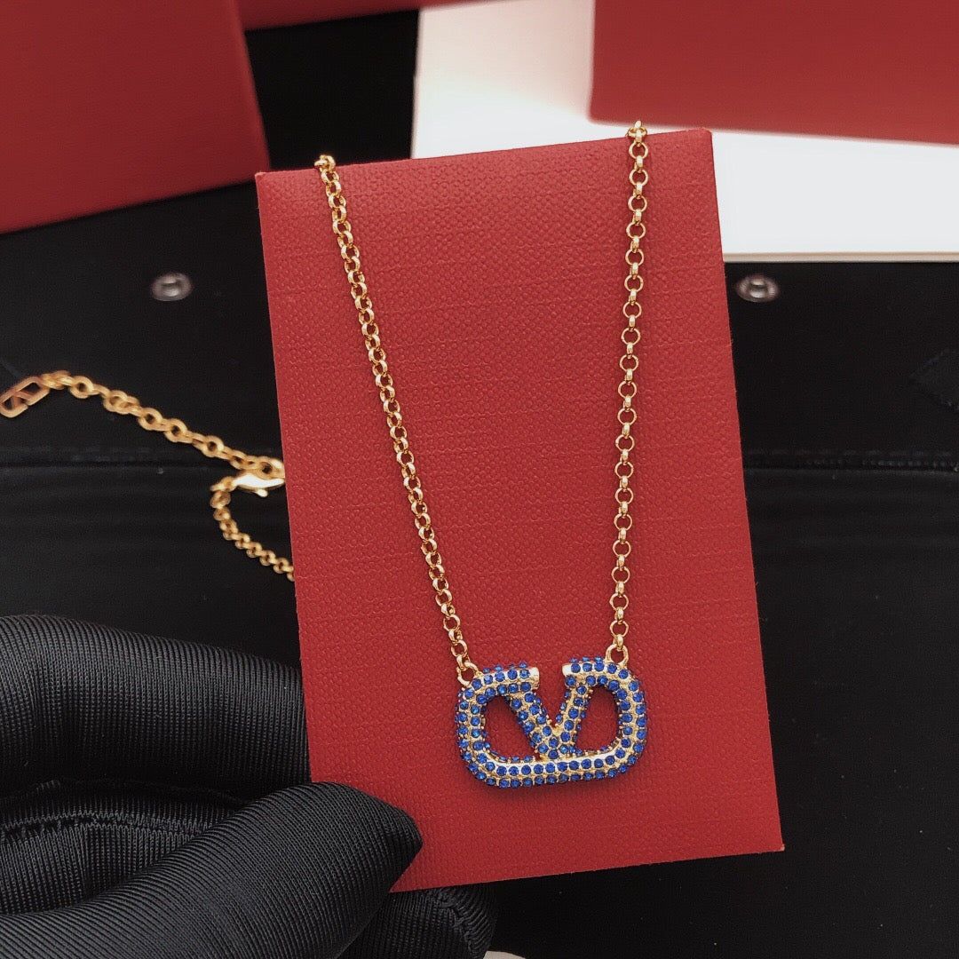 Signature Emblem Crystal-Accent Pendant Necklace – Design 05 styled detail