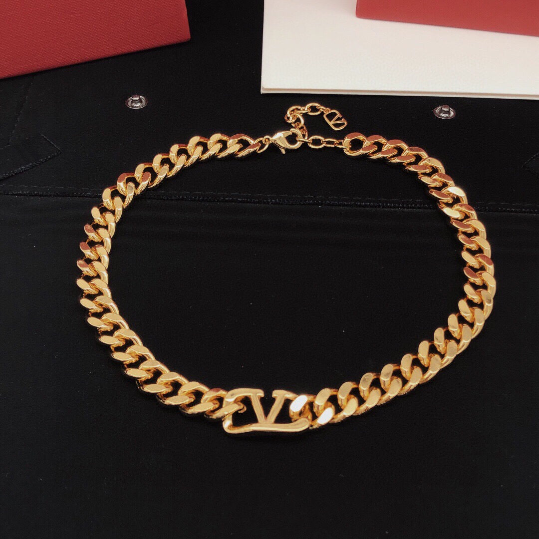 Signature Emblem Pendant Necklace in Gold-Tone – Design 11 close-up view