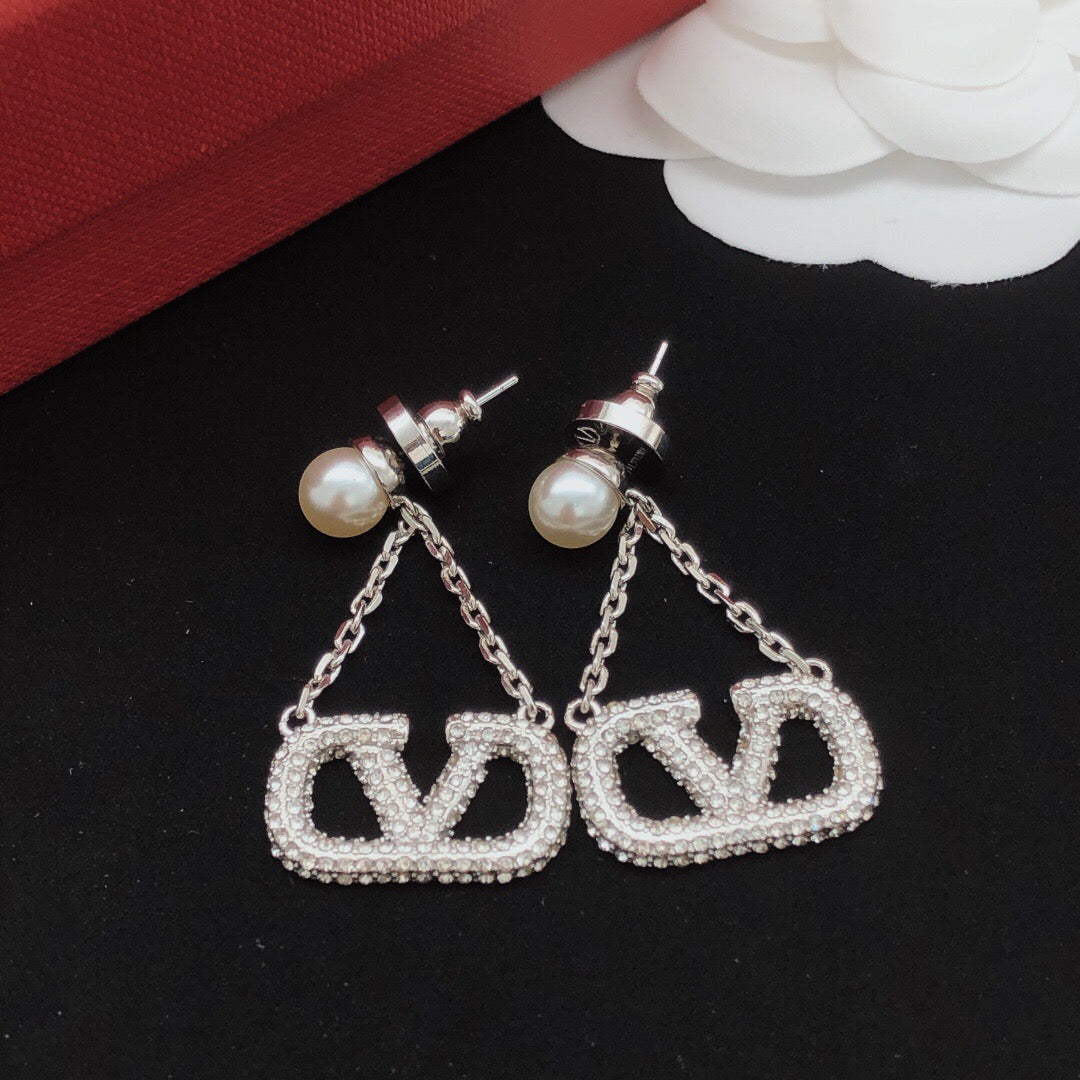 Signature Emblem Crystal-Accent Stud Earrings – Design 11 close-up view