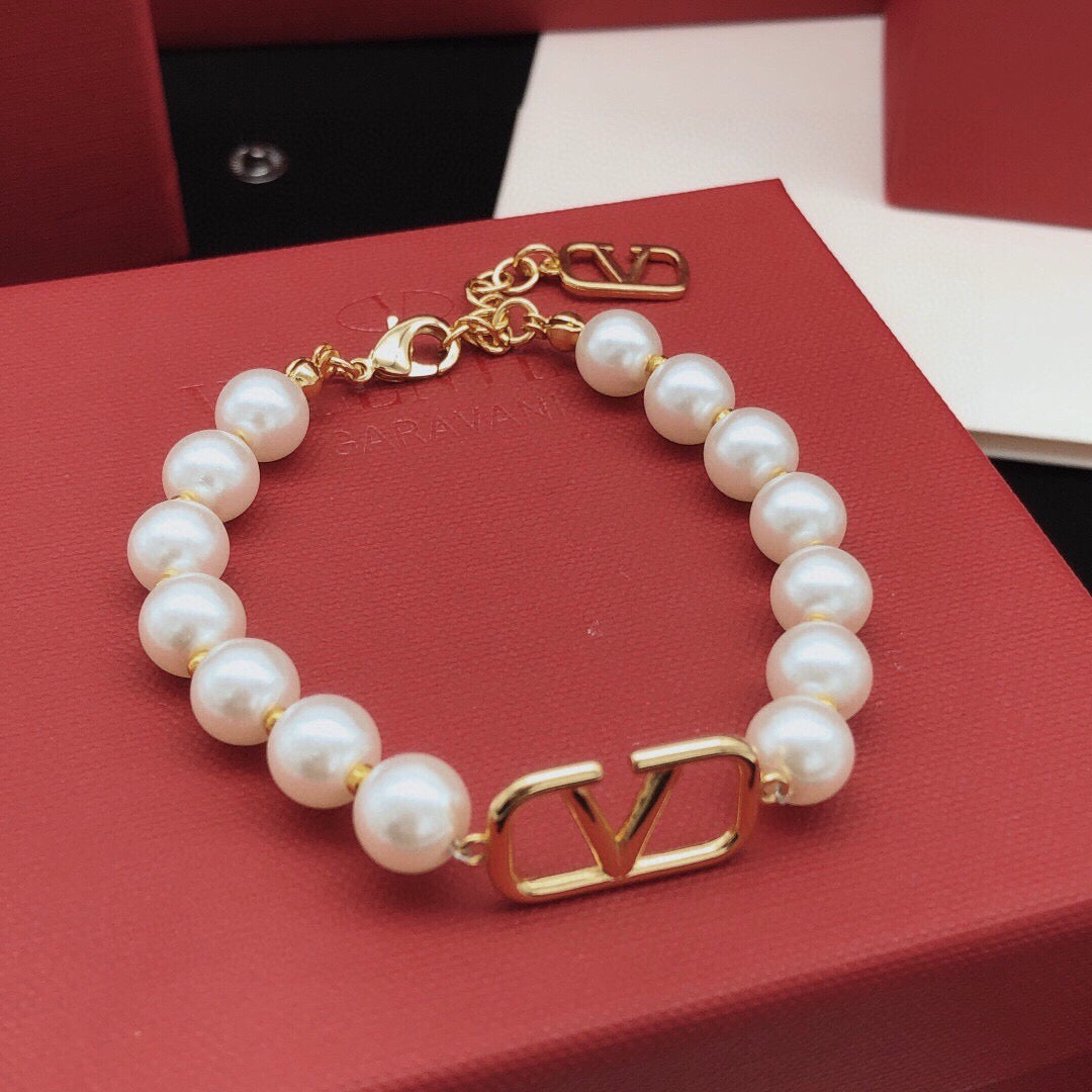 Signature Emblem Bracelet in Gold-Tone – Design 09 close-up view