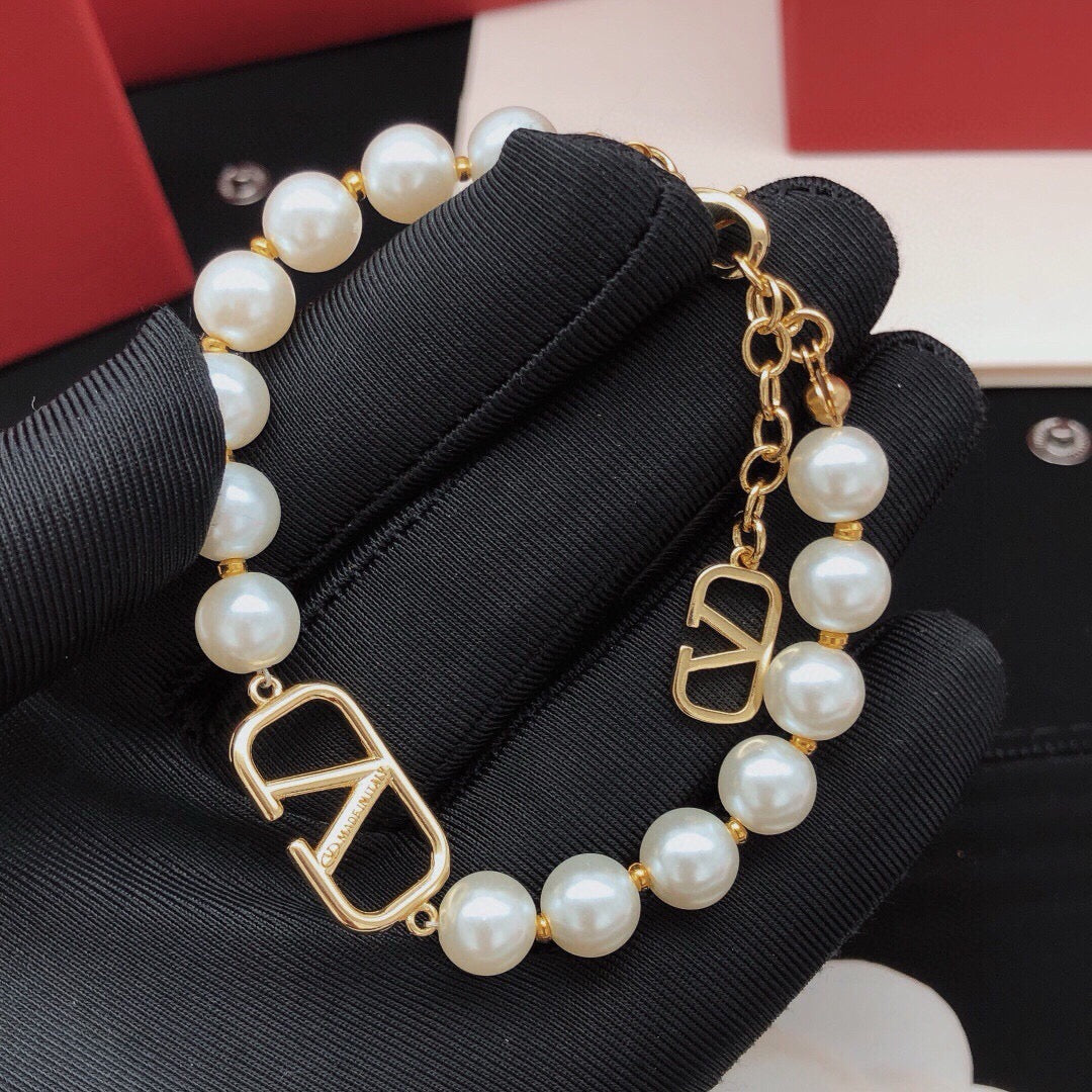 Signature Emblem Bracelet in Gold-Tone – Design 11 front view