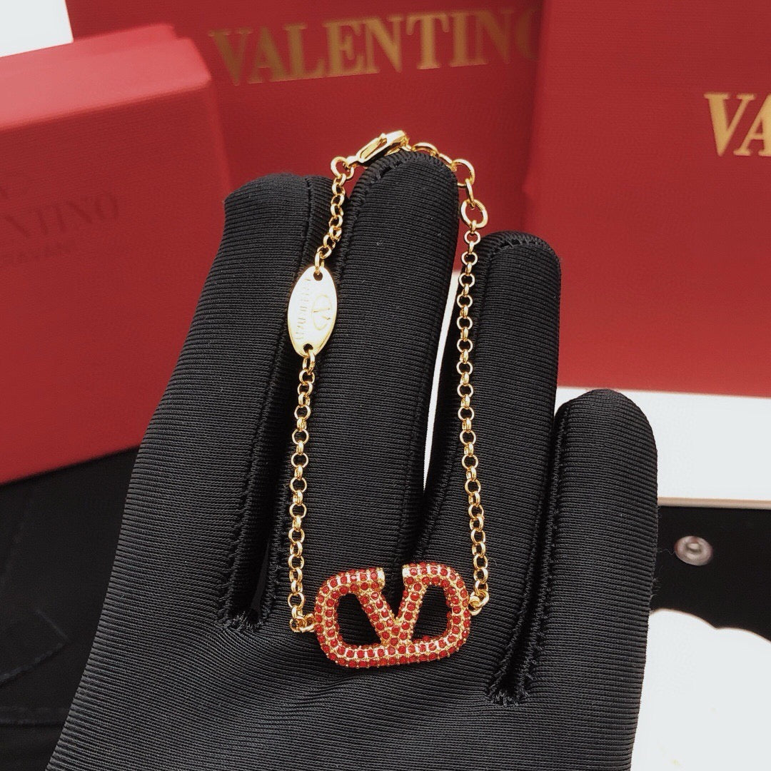 Signature Emblem Jewelry Accessory – Red side detail