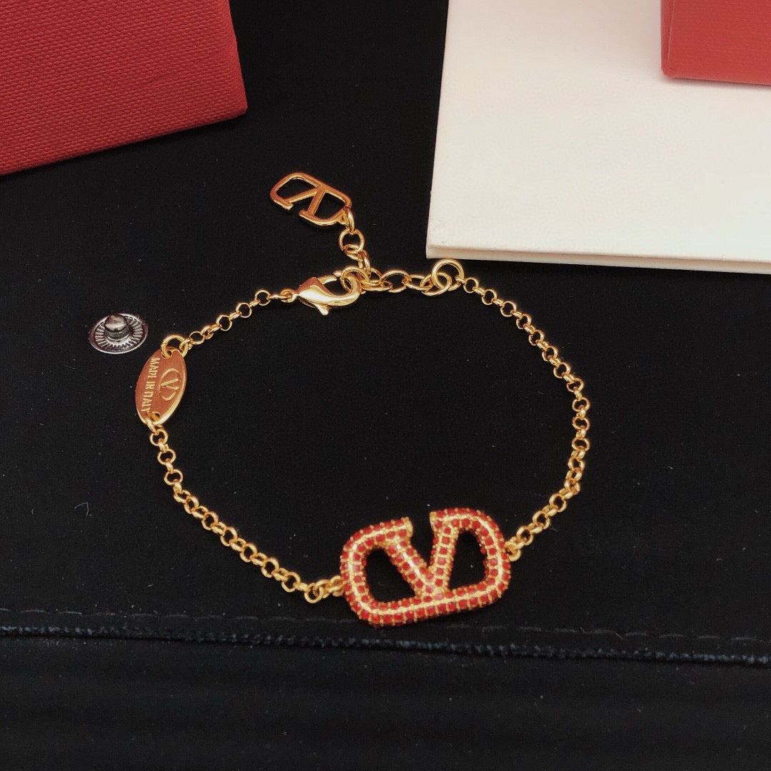 Signature Emblem Jewelry Accessory – Red main product view