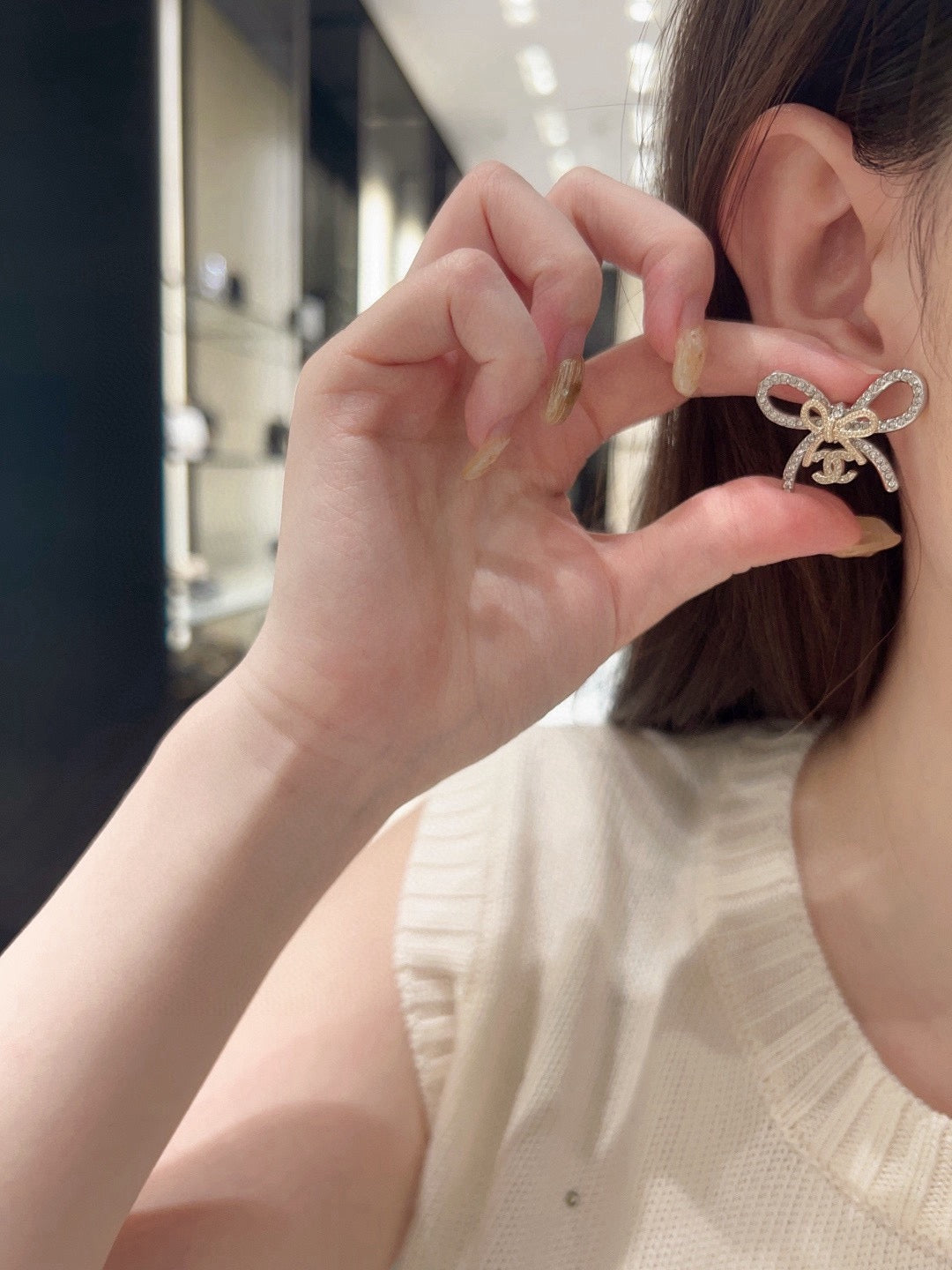 Double-C Emblem Stud Earrings in Polished Metal-Tone – Design 065 detail view