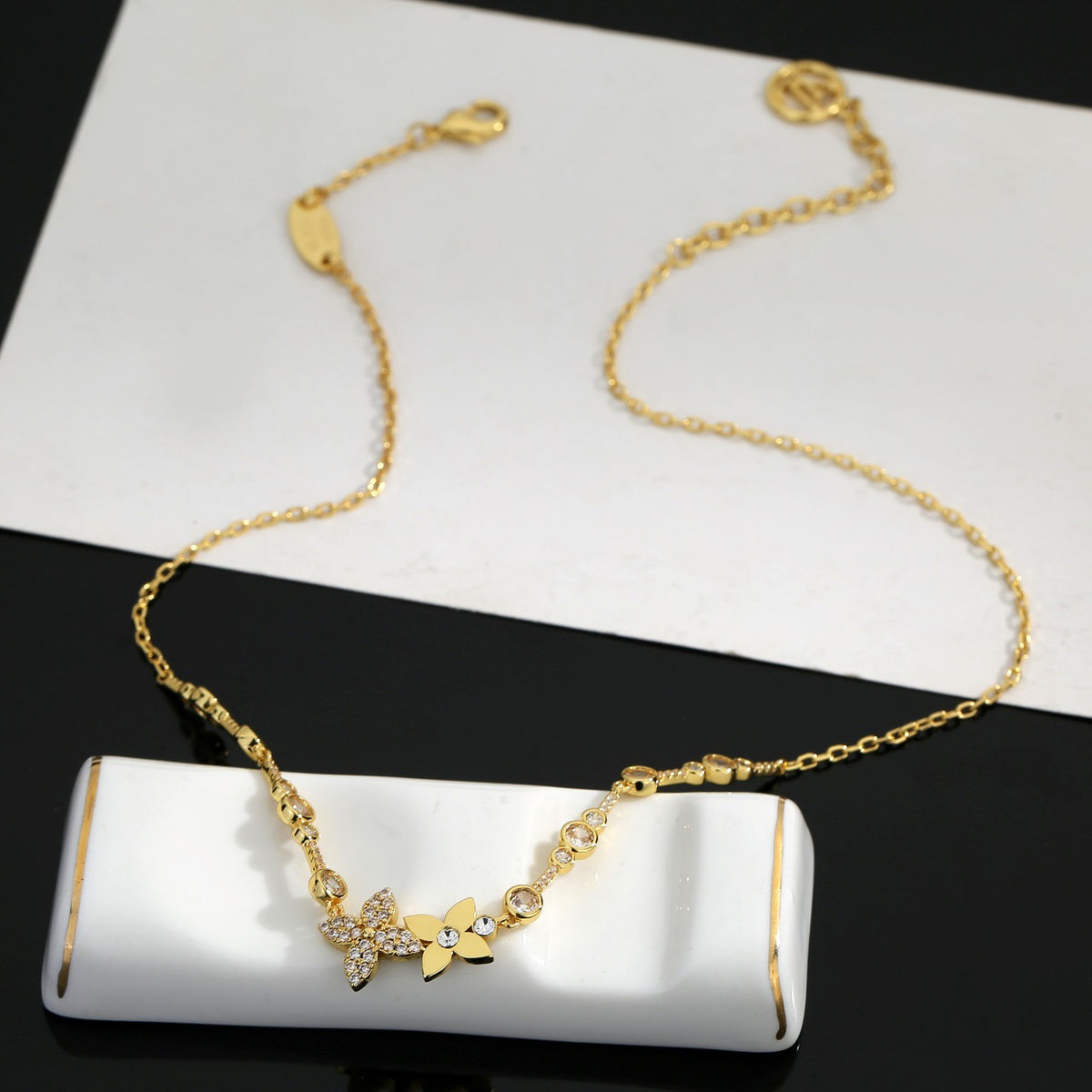 Martin Graham pendant necklace in polished metal-tone – front product view