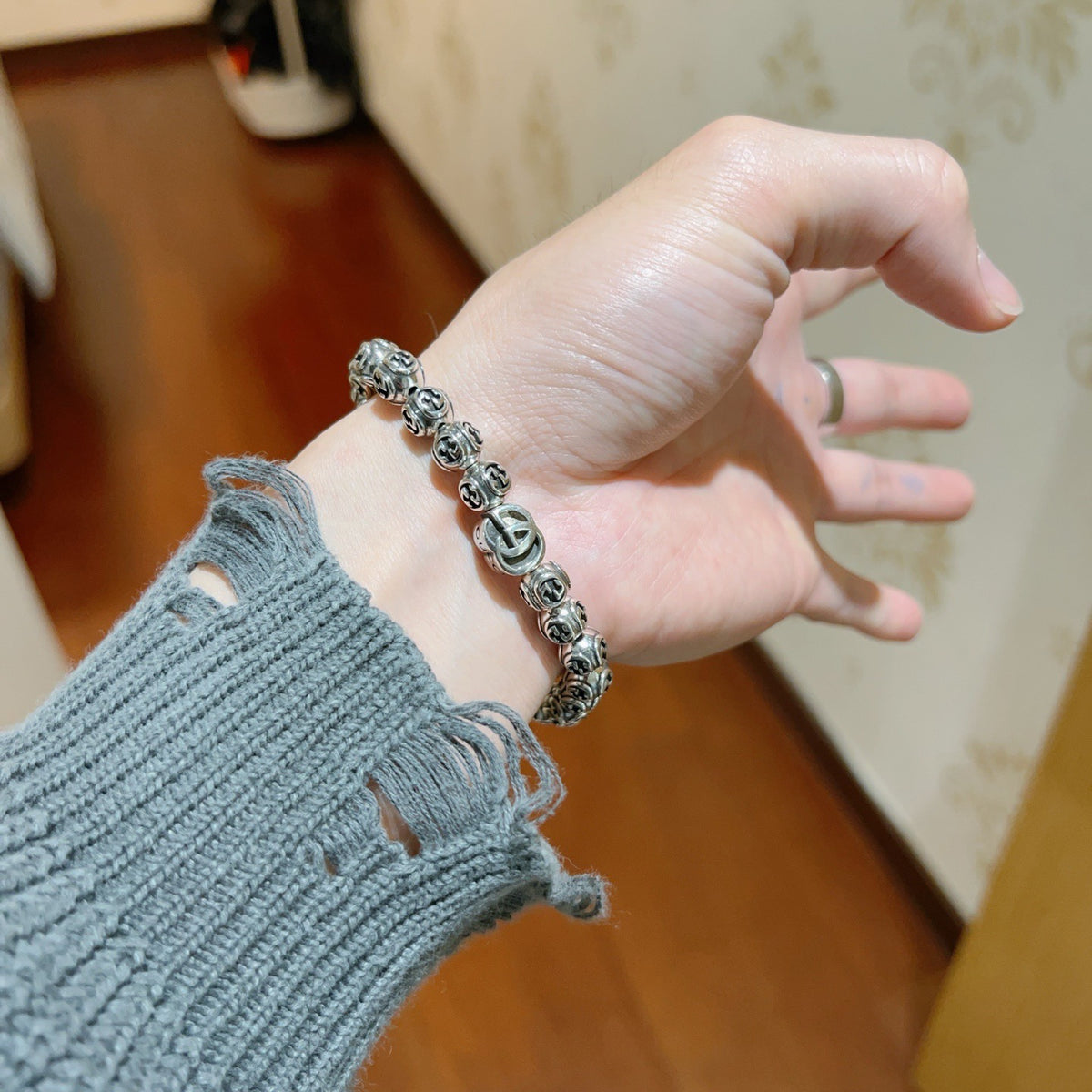 Martin Graham bracelet in polished metal-tone – side detail