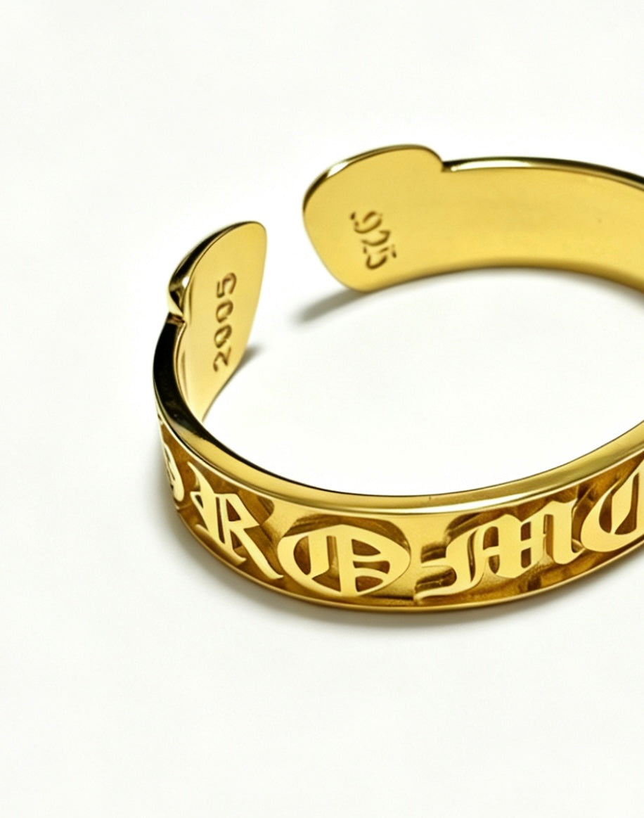 Signature Emblem Bangle in Polished Metal-Tone – Design 004 detail view