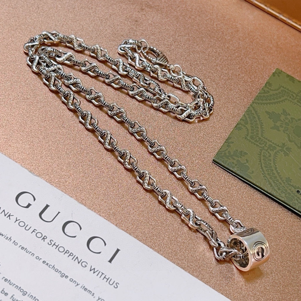 Double-G Emblem Pendant Necklace in Polished Metal-Tone – Vintage Detail – Design 025 main product view