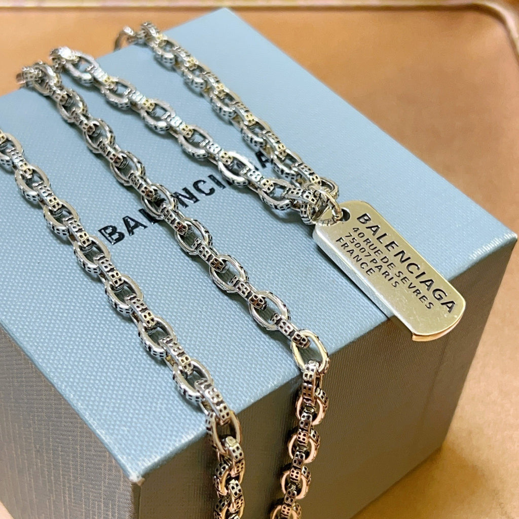 Martin Graham pendant necklace in polished metal-tone – front product view