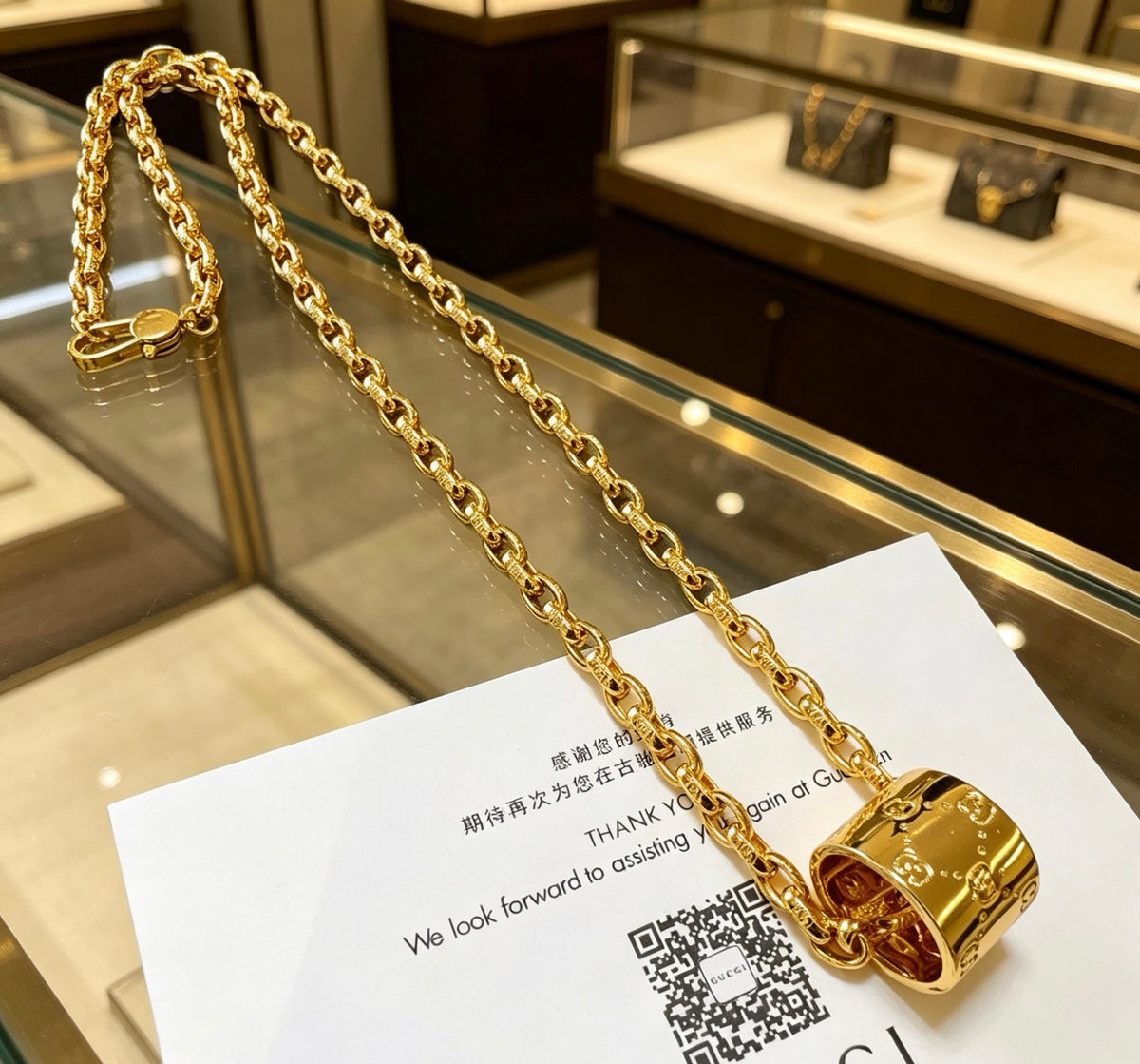 Double-G Emblem Pendant Necklace in Gold-Tone – Design 009 close-up detail