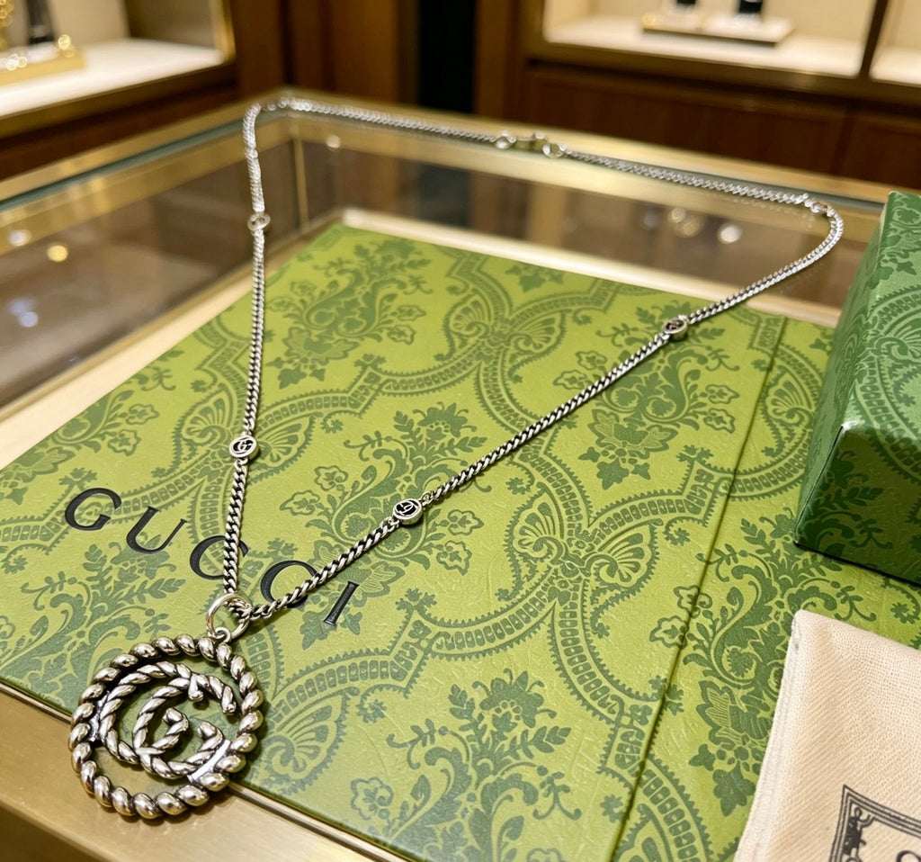 Double-G Emblem Pendant Necklace in Silver-Tone – Vintage Detail – Design 015 styled product view