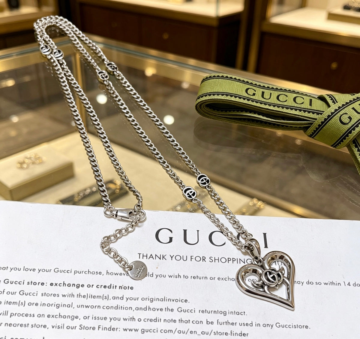 Double-G Emblem Pendant Necklace in Polished Metal-Tone – Design 046 close-up detail