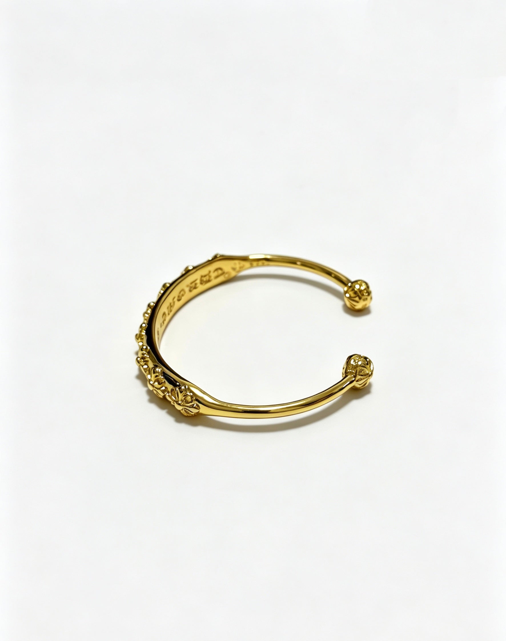 Signature Emblem Bangle in Polished Metal-Tone – Design 002 detail view