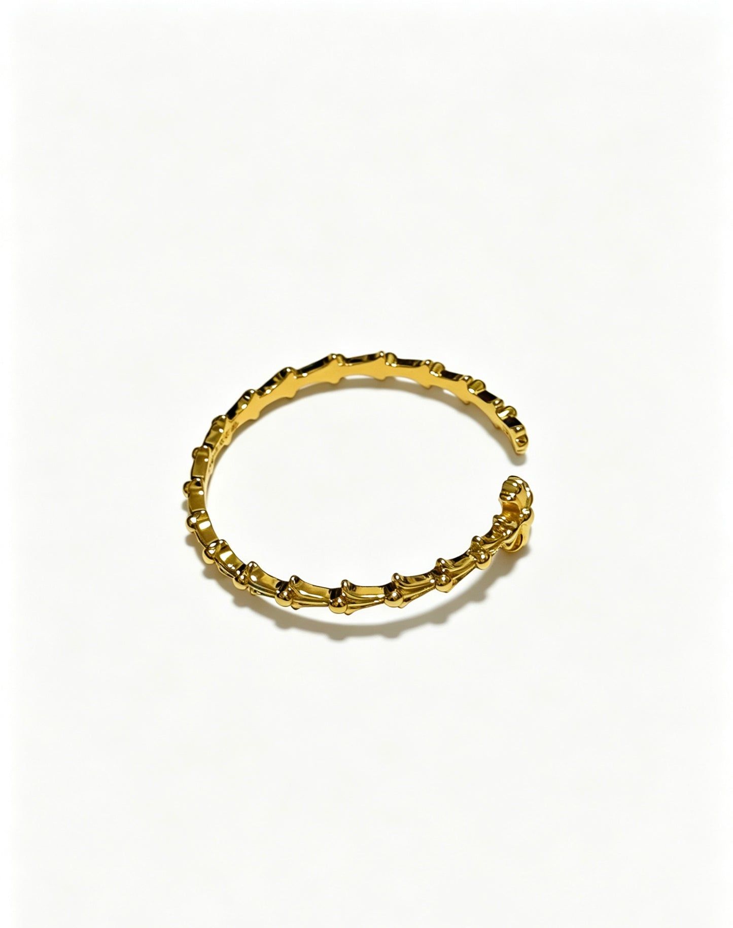 Signature Emblem Bangle in Polished Metal-Tone – Design 001 side detail
