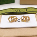 Double-G Emblem Stud Earrings in Polished Metal-Tone – Vintage Detail – Design 006 main product view