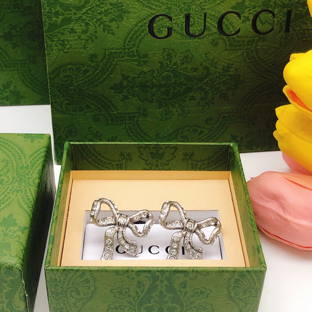 Bow Crystal-Accent Stud Earrings close-up detail