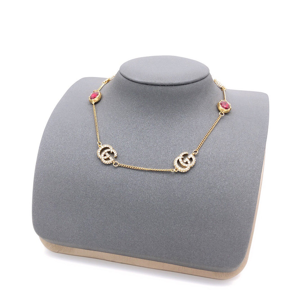 Geometric Emblem Pendant Necklace in Silver-Tone – Red Detail styled product view