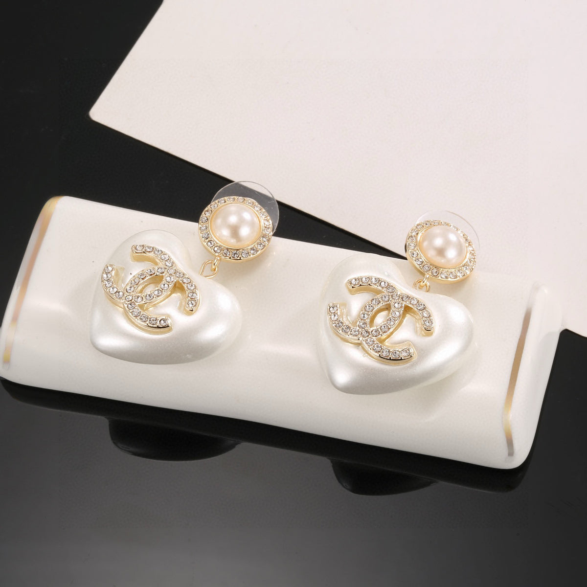Signature Emblem Stud Earrings in Polished Metal-Tone – Design 017 close-up detail