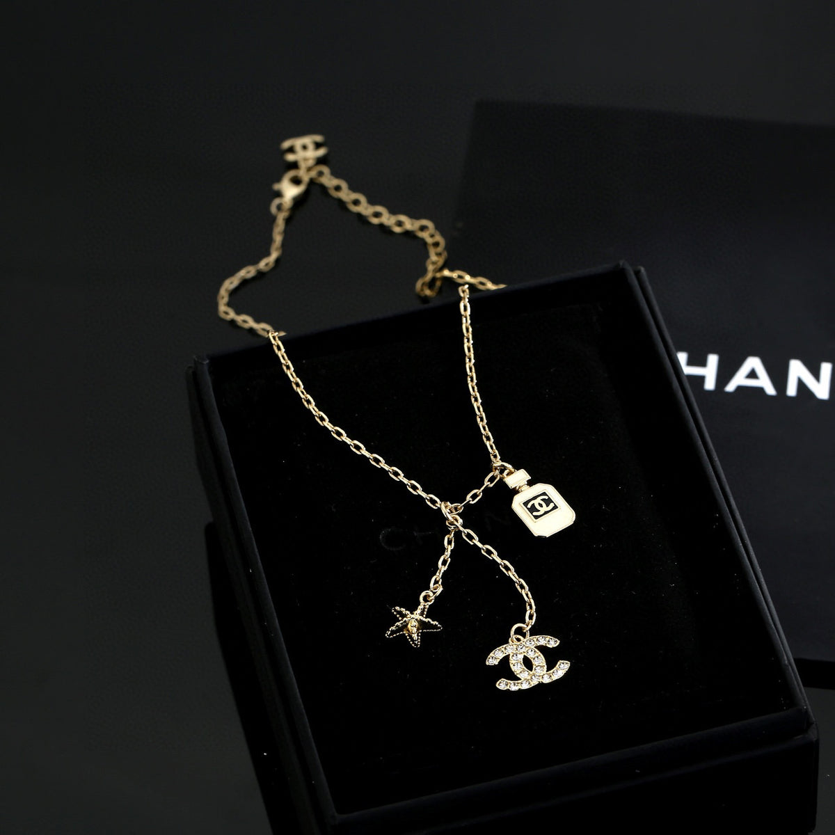 Double-C Emblem Pendant Necklace in Polished Metal-Tone – Design 009 close-up detail