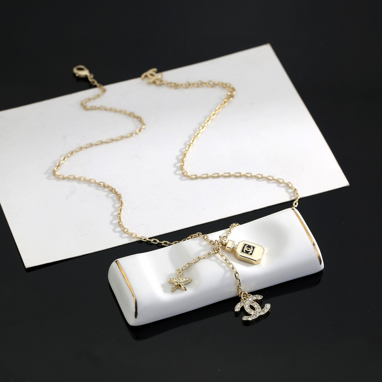 Double-C Emblem Pendant Necklace in Polished Metal-Tone – Design 010 front product view
