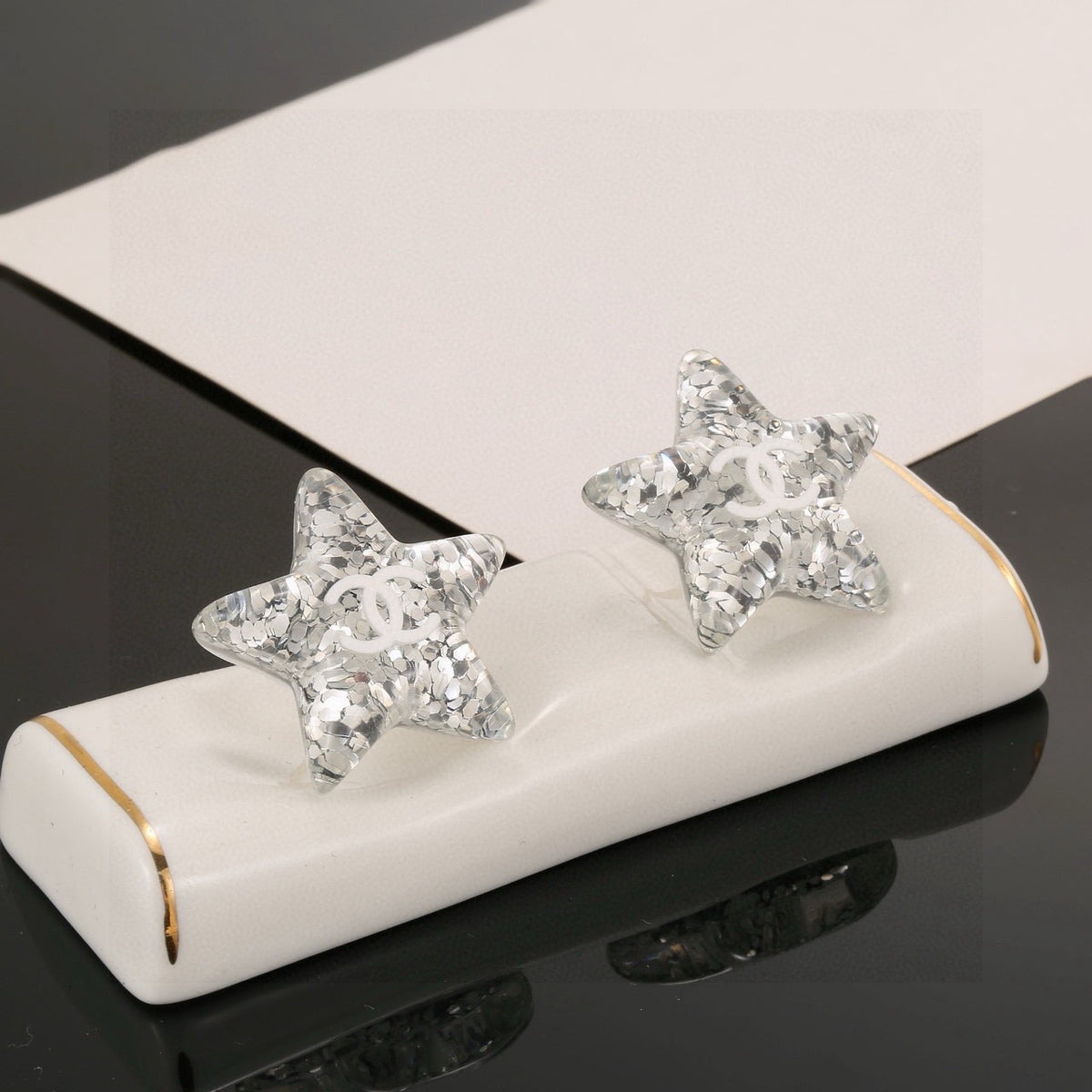 Double-C Emblem Stud Earrings in Silver-Tone – Star Detail detail view