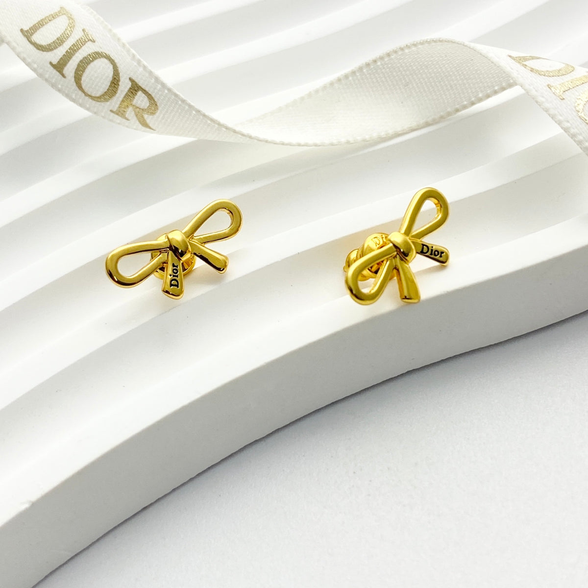 Bow & Butterfly Motif Stud Earrings in Gold-Tone with Openwork Detail side detail