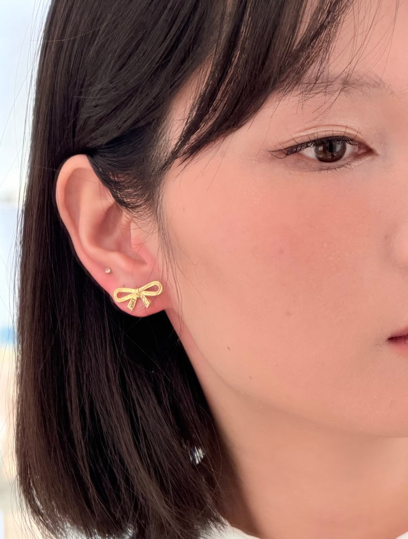 Bow & Butterfly Motif Stud Earrings in Gold-Tone with Openwork Detail detail view