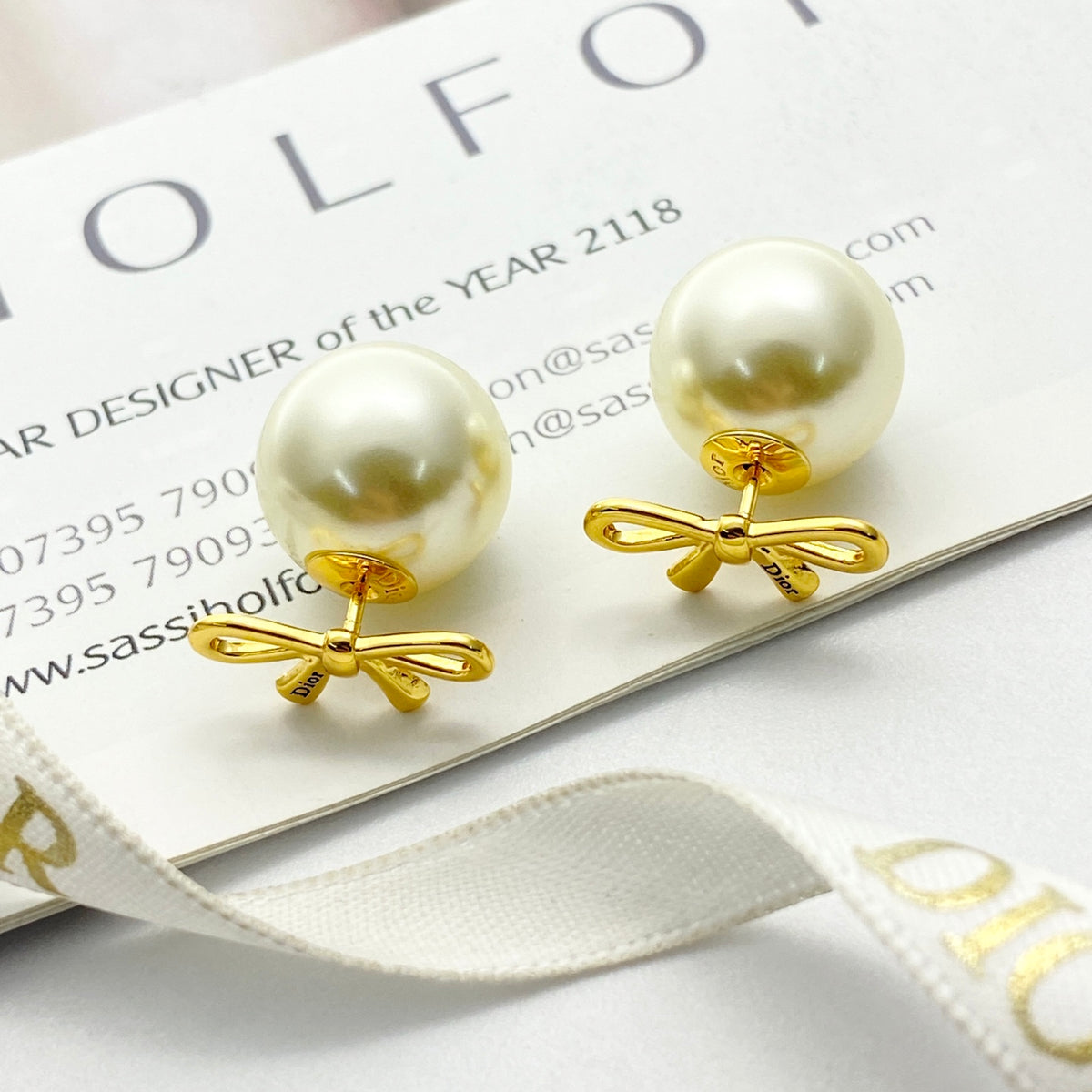Bow & Butterfly Motif Stud Earrings in Gold-Tone with Pearl-Style Detail – Design 002 front view