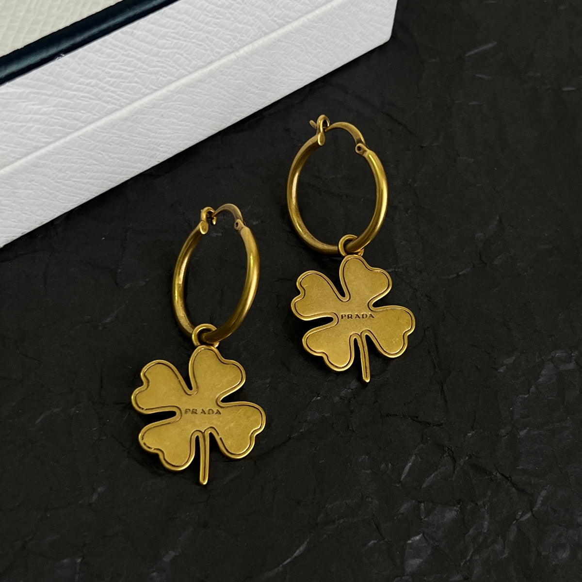 Signature Emblem Statement Earrings in Polished Metal-Tone – Vintage close-up view