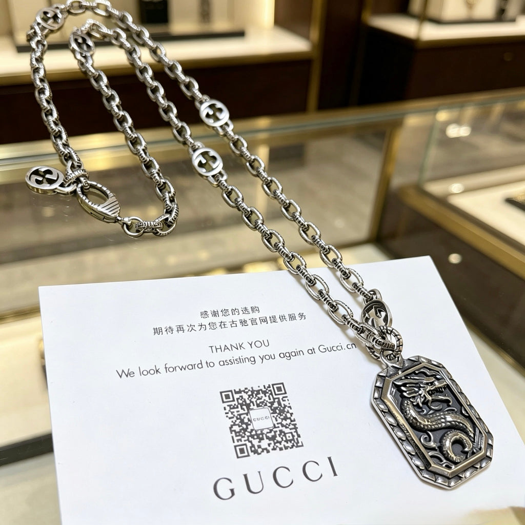 Double-G Emblem Pendant Necklace in Polished Metal-Tone – Design 056 detail view