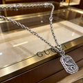 Double-G Emblem Pendant Necklace in Polished Metal-Tone – Design 073 main product view